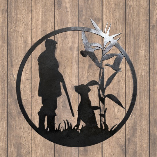 Man with dog hunting waterfowl